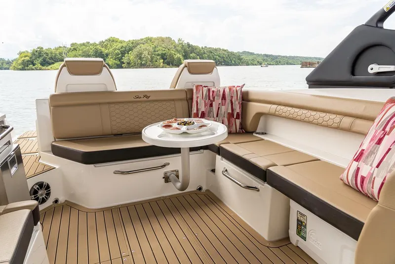 Slide: The Image of Manufacturer Provided Image: Luxurious seating area on the 2023 Sea Ray SDX 290 boat with scenic lake view. - 9