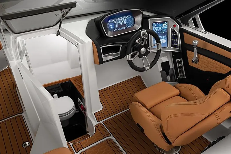 Slide: The Image of Manufacturer Provided Image: 2020 MasterCraft X26 boat interior with modern dashboard and luxurious seating. - 13