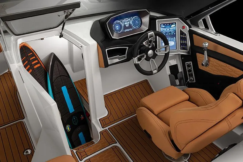Slide: The Image of Manufacturer Provided Image: 2020 MasterCraft X26 boat interior with modern dashboard and surfboard storage. - 5