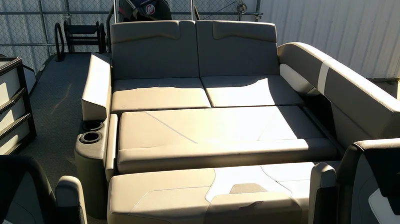 Slide: The Image of The image shows the spacious cockpit of a 2026 Evotti 523CS with gray upholstery. - 15
