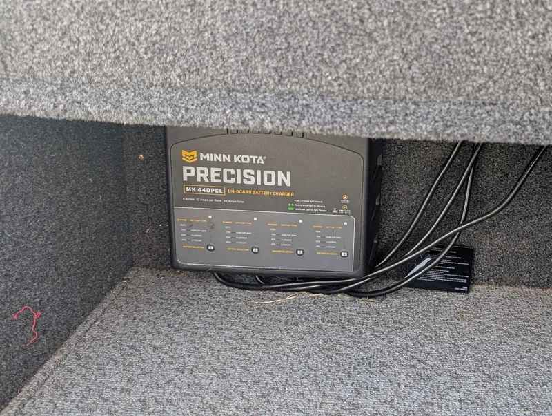 Slide: The Image of Minn Kota Precision charger in Lund 1875 Impact boat, 2023 model. - 11