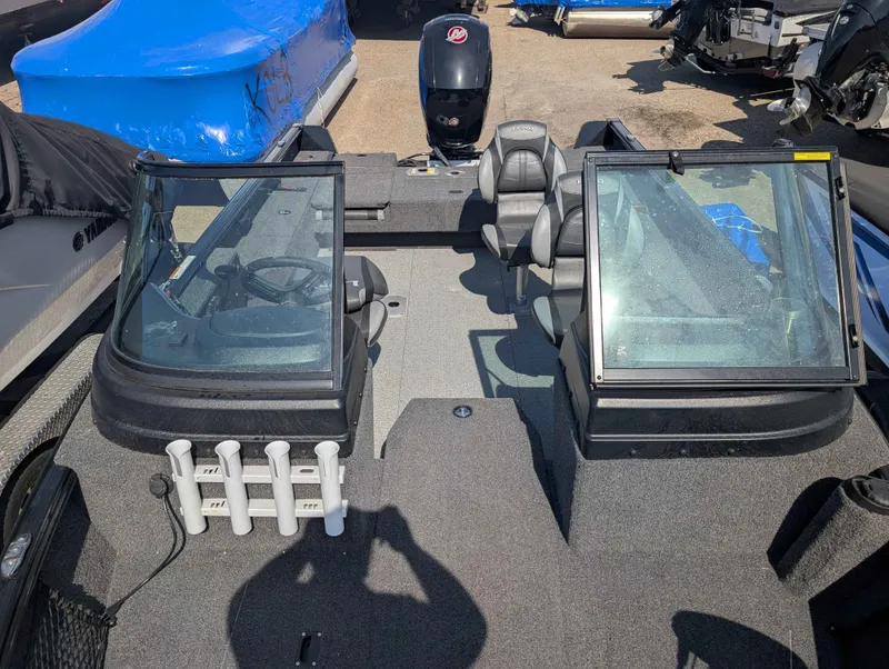 Slide: The Image of Interior view of 2023 Lund 1875 Impact boat with seats and steering. - 7