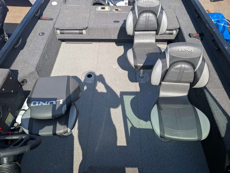 Slide: The Image of Interior of 2023 Lund 1875 Impact boat with gray seats. - 8