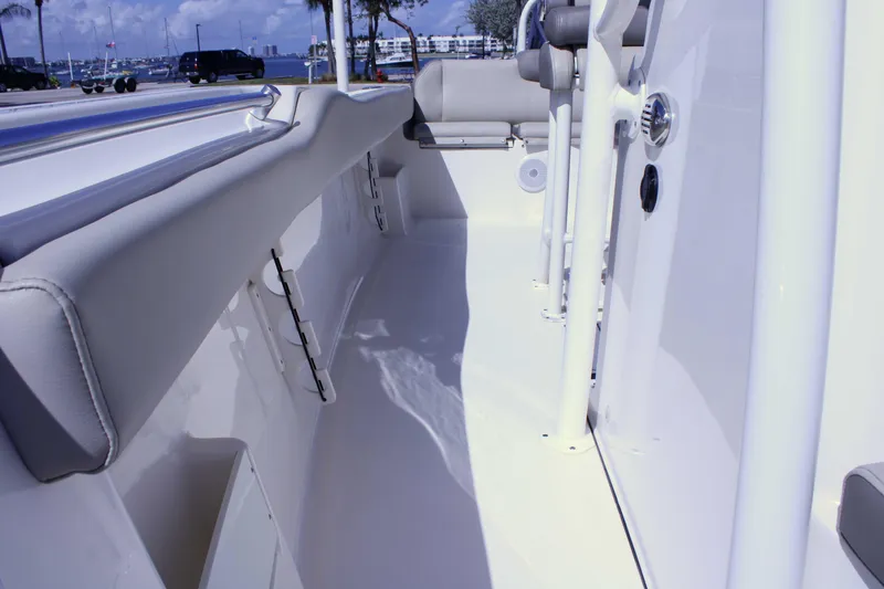 Slide: The Image of 2021 Key West 239 FS boat interior with sleek seating and modern design. - 21