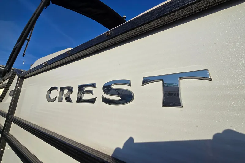 Slide: The Image of Crest Classic 230 SLC 2017 boat with chrome logo on side panel. - 10