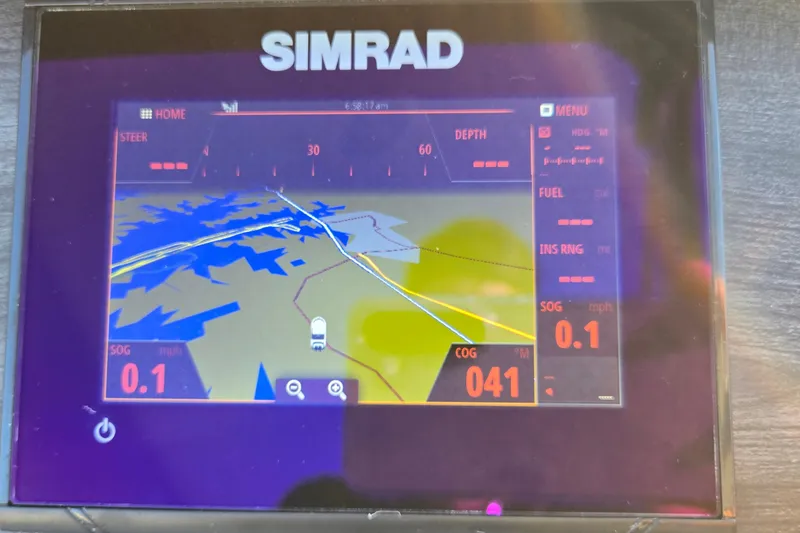 Slide: The Image of Simrad navigation display on 2017 Crest Classic 230 SLC boat, showing map and speed data. - 30