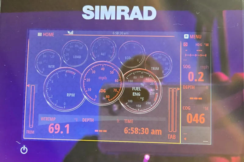 Slide: The Image of Simrad display on 2017 Crest Classic 230 SLC showing speed, RPM, and water temperature. - 31