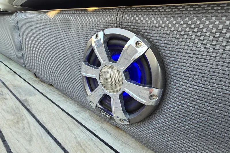 Slide: The Image of Speaker with blue LED light on 2017 Crest Classic 230 SLC boat interior. - 44