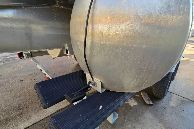 Slide: The Image of Close-up of a 2017 Crest Classic 230 SLC pontoon boat on a trailer. - 50