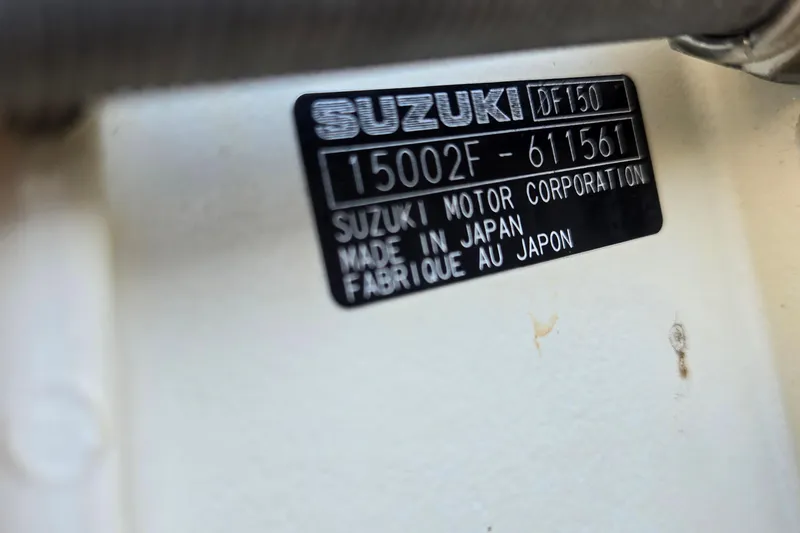 Slide: The Image of Label on Suzuki DF150 engine, made in Japan, on 2017 Crest Classic 230 SLC. - 54