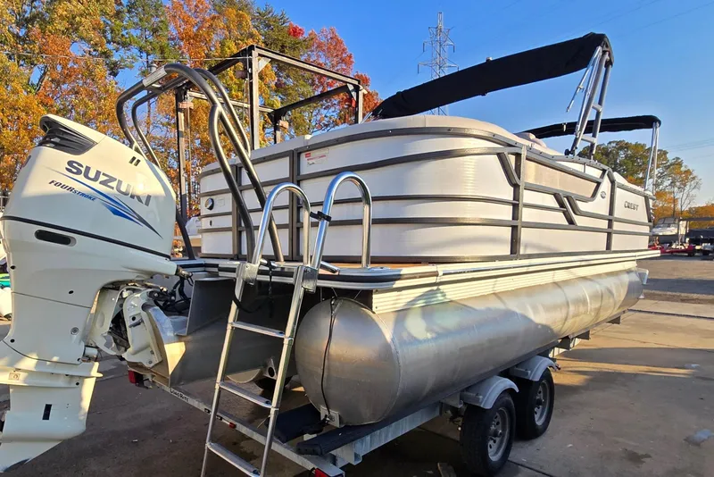 Slide: The Image of Crest Classic 230 SLC 2017 pontoon boat with Suzuki outboard motor. - 6