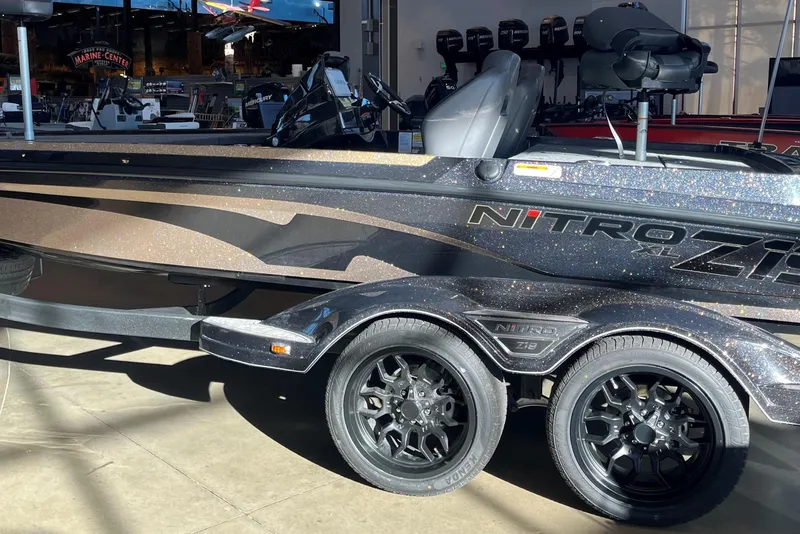 The Image of 2026 Nitro Z19 XL Pro boat with sleek design and dual-axle trailer. - 0