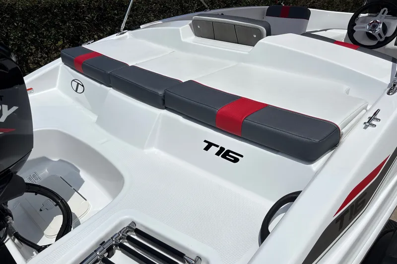Slide: The Image of 2026 Tahoe T16 boat interior with sleek seating and modern design. - 6