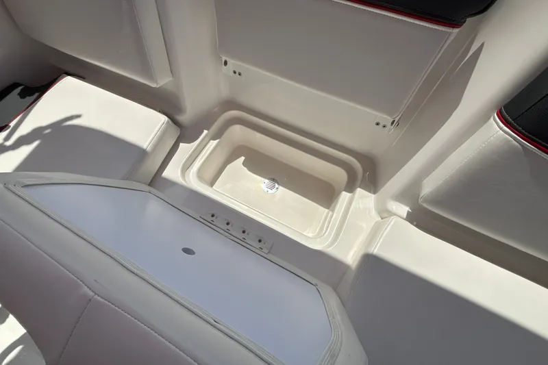 Slide: The Image of Interior view of 2026 Tahoe T16 boat, featuring a storage compartment. - 21