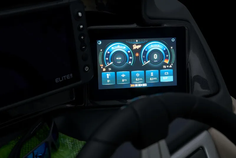 Slide: The Image of Luxurious seating on 2025 Ranger Reata 220F boat with quilted upholstery and cup holders. - 33