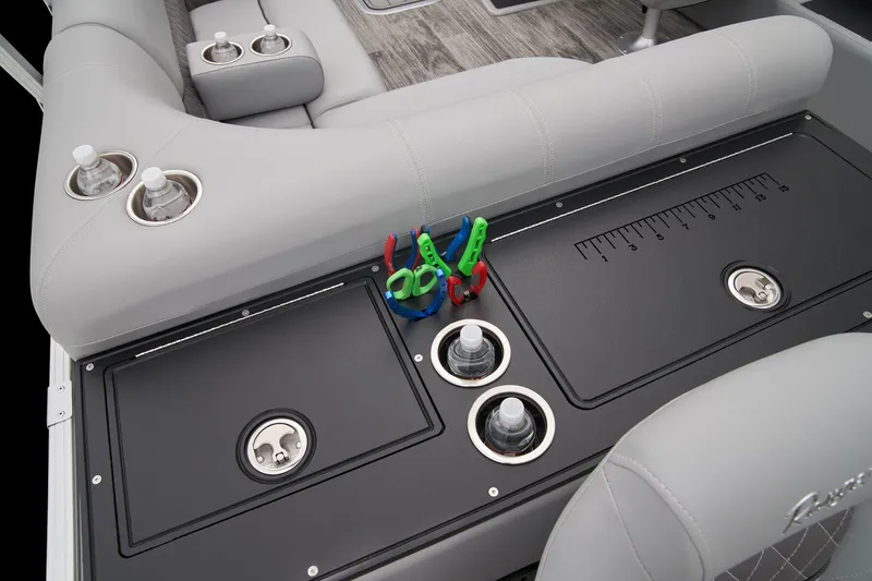 Slide: The Image of 2025 Ranger Reata 223FC boat interior with seating and storage compartments. - 41