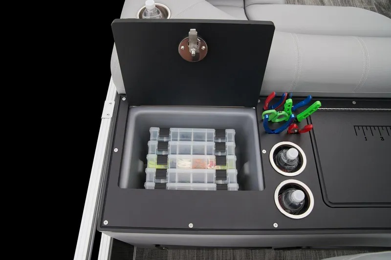 Slide: The Image of 2025 Ranger Reata 223FC storage compartment with secure latch and sleek design. - 44
