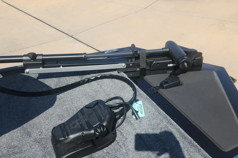 Slide: The Image of 2026 Tracker Bass Tracker Classic XL boat with Minn Kota trolling motor on deck. - 69