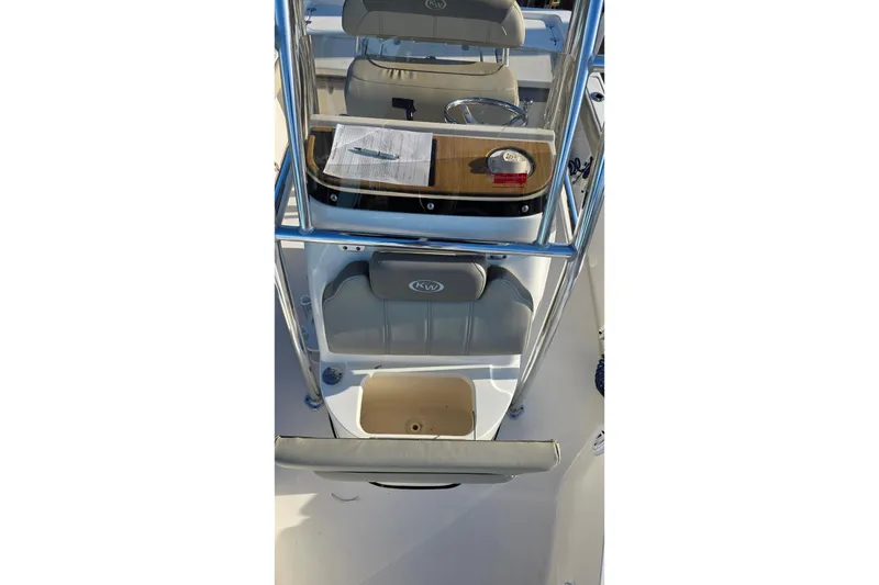 Slide: The Image of 2023 Key West 210 Bay Reef boat interior with console and seating. - 18