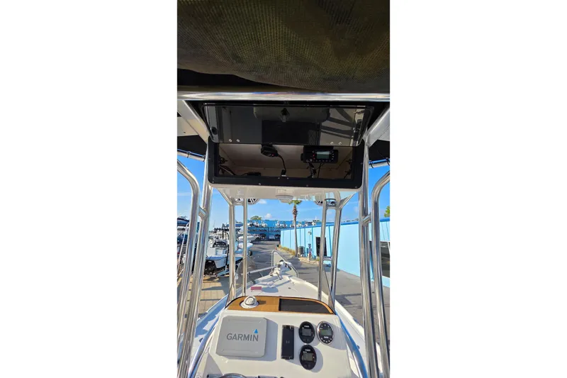 Slide: The Image of 2023 Key West 210 Bay Reef boat dashboard with Garmin navigation system. - 19