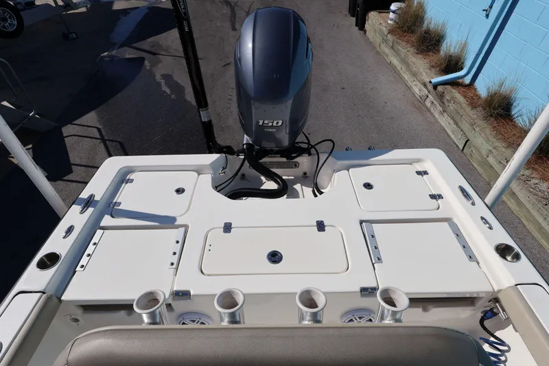 Slide: The Image of 2023 Key West 210 Bay Reef boat with Yamaha 150 engine, rear deck view. - 21