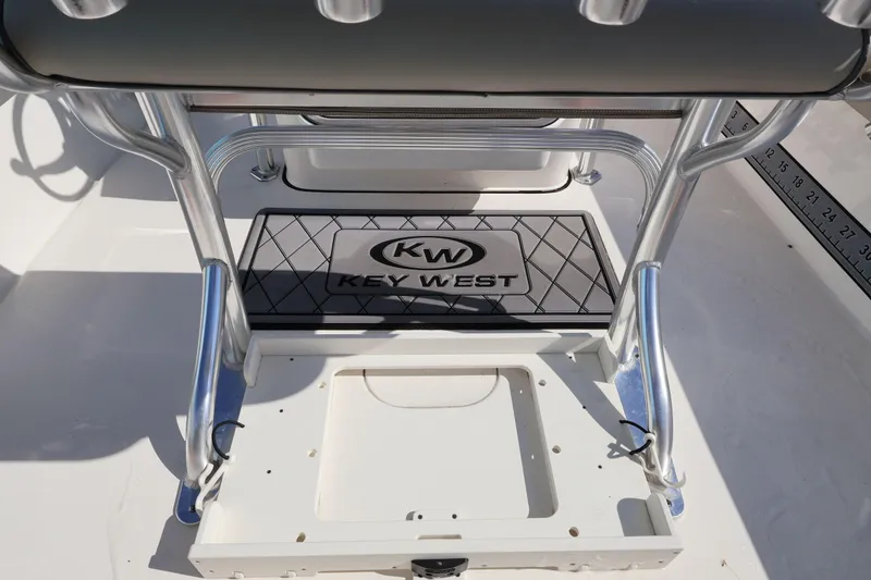 Slide: The Image of 2023 Key West 210 Bay Reef boat interior with branded mat and seating. - 29