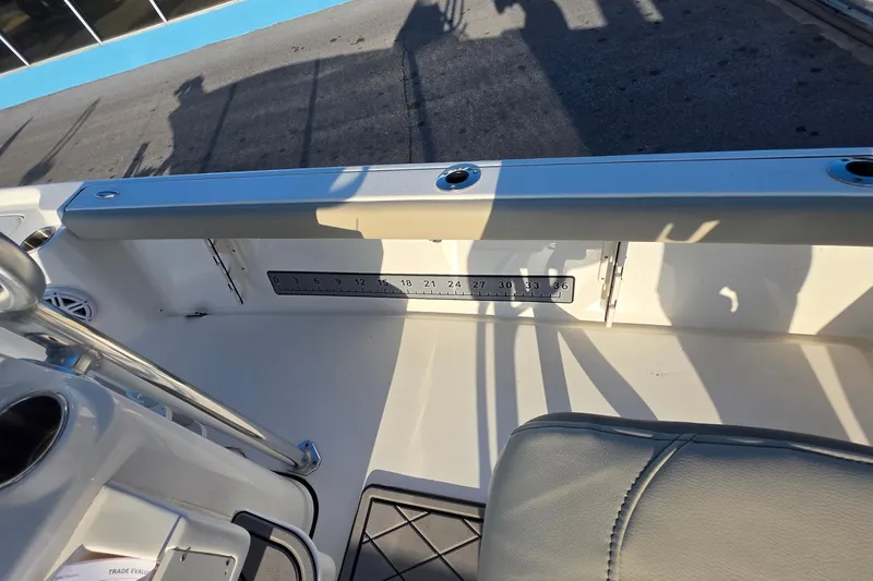 Slide: The Image of 2023 Key West 210 Bay Reef boat interior with built-in measuring ruler. - 32