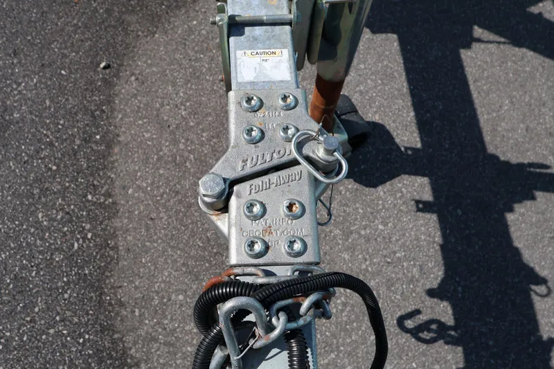Slide: The Image of Trailer hitch mechanism on a 2023 Key West 210 Bay Reef boat. - 35