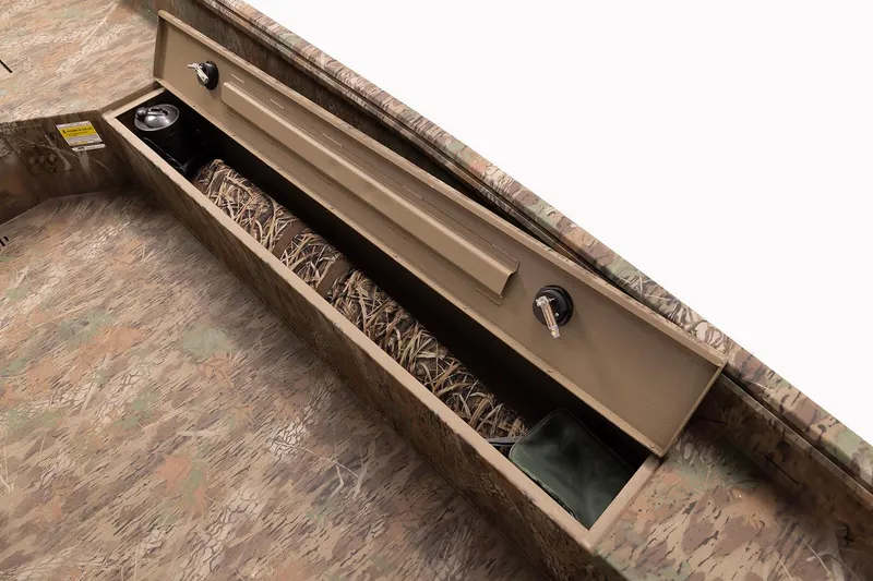 Slide: The Image of 2026 G3 Gator Tough 17 DK boat interior with storage compartment open. - 4