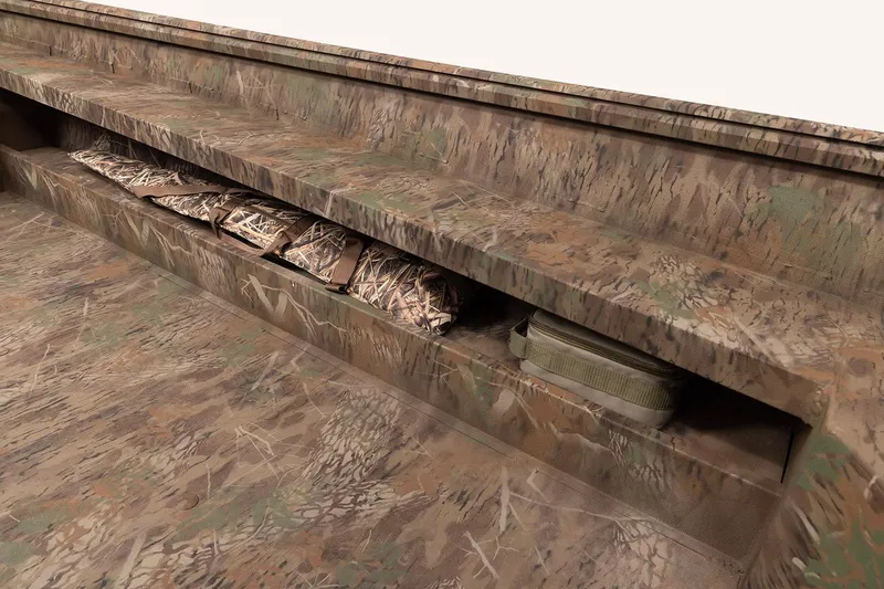 Slide: The Image of 2026 G3 Gator Tough 17 DK boat interior with camouflage seating and storage compartments. - 5