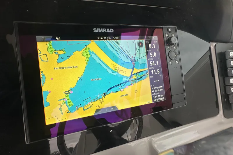 Slide: The Image of Simrad navigation display on 2022 Robalo R247 Dual Console boat, showing East Harbor map. - 10