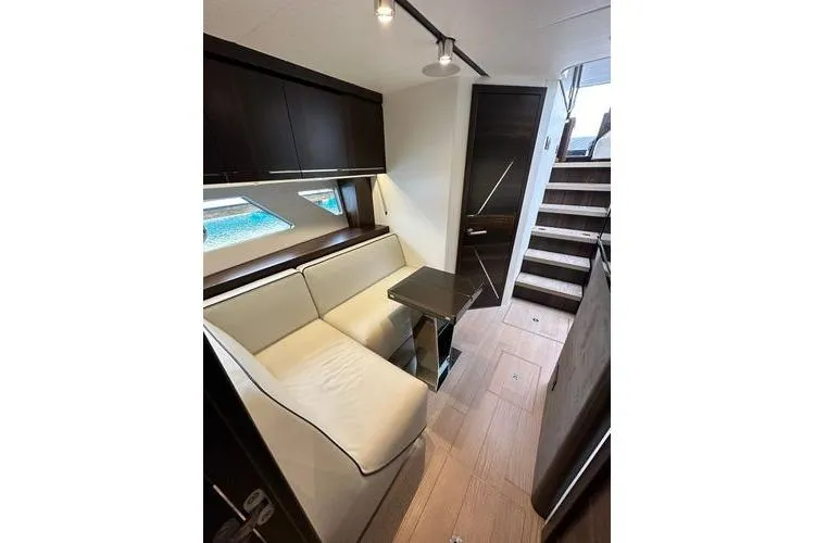 Slide: The Image of Luxurious interior of 2021 Sunseeker Predator 60 EVO yacht with elegant seating and modern design. - 22