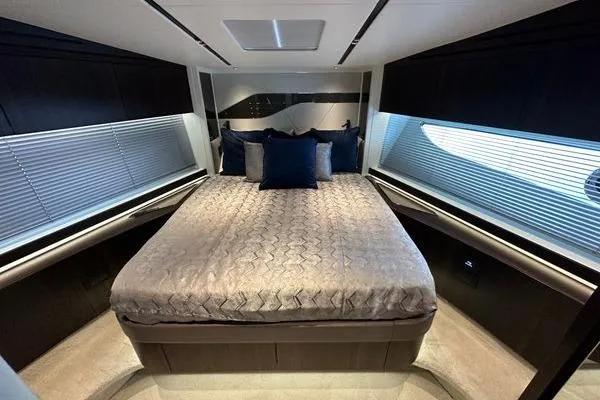 Slide: The Image of Luxurious bedroom interior of 2021 Sunseeker Predator 60 EVO yacht with modern design. - 25