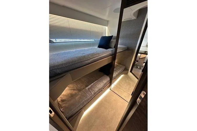 Slide: The Image of Interior of 2021 Sunseeker Predator 60 EVO yacht with modern bunk beds. - 29