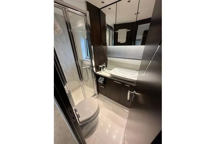 Slide: The Image of Luxurious bathroom in 2021 Sunseeker Predator 60 EVO yacht with modern fixtures and sleek design. - 34