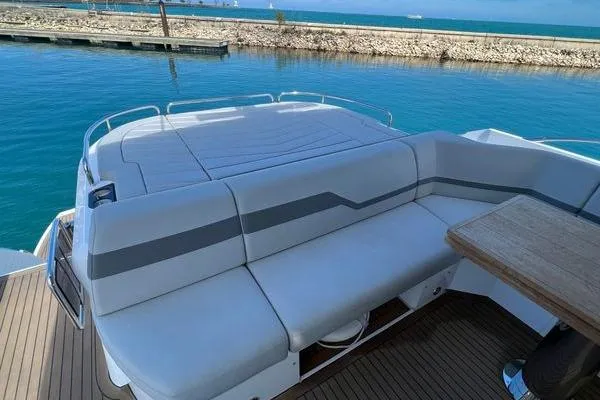 Slide: The Image of Luxurious Sunseeker Predator 60 EVO yacht deck with seating, 2021 model. - 38