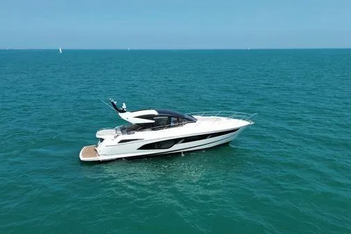 Slide: The Image of 2021 Sunseeker Predator 60 EVO yacht cruising on open sea. - 39