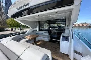 Slide: The Image of 2021 Sunseeker Predator 60 EVO yacht with spacious deck and modern design. - 5