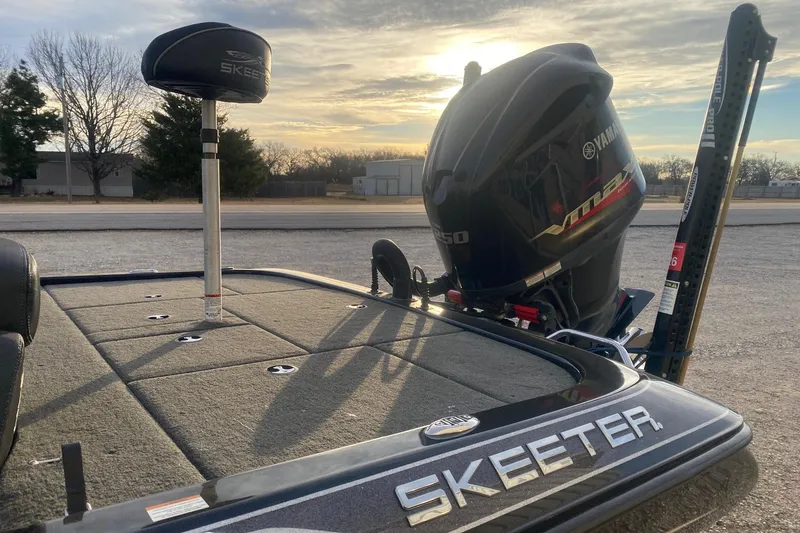 Slide: The Image of 2019 Skeeter ZX250 boat with Yamaha VMAX engine at sunset. - 8