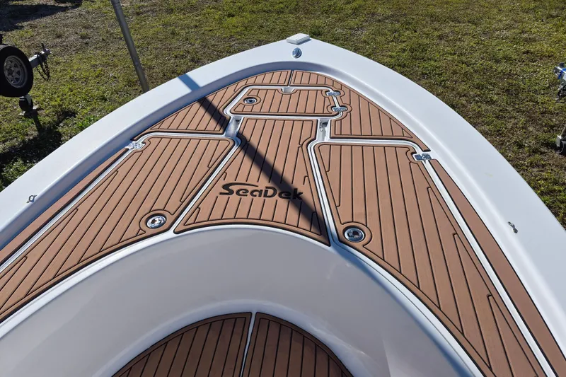 Slide: The Image of 2017 Sportsman Masters 207 Bay Boat with Yamaha engine, docked outdoors. - 6