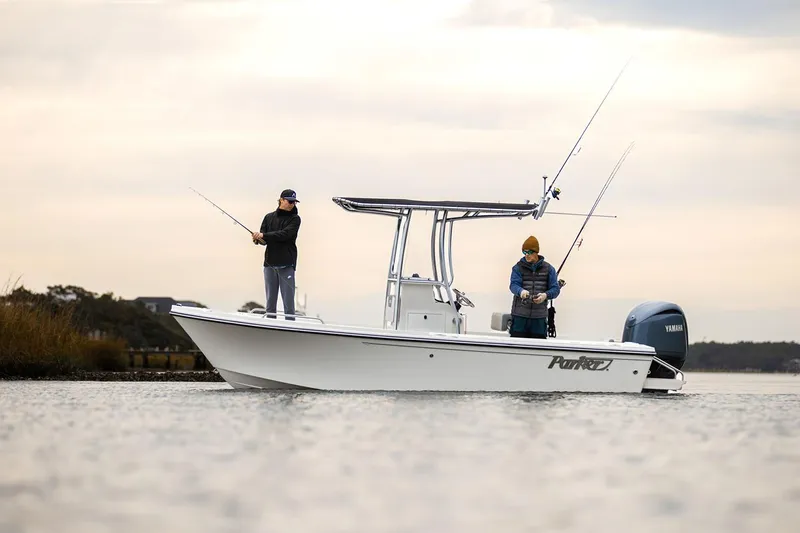 Slide: The Image of Manufacturer Provided Image: 2026 Parker 180 Coastal boat on water, two people onboard, Yamaha 150 engine. - 3