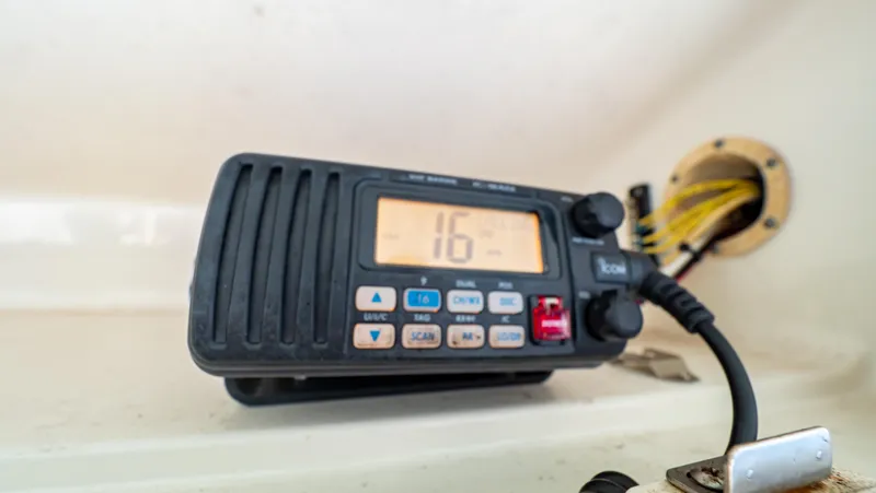 Slide: The Image of Marine radio on 2010 Robalo R305 Walkaround boat, channel 16 displayed. - 37