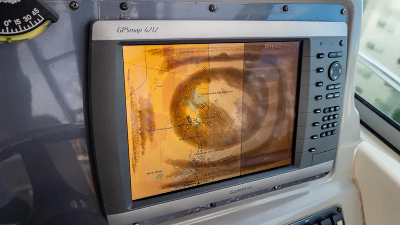 Slide: The Image of Garmin GPSmap 4212 on 2010 Robalo R305 Walkaround boat dashboard. - 40