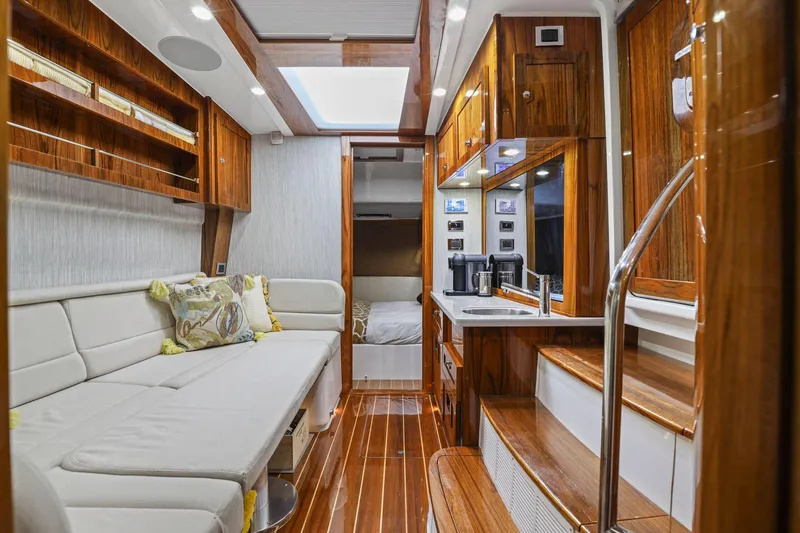 Slide: The Image of Luxurious interior of 2023 HCB 65 Estrella yacht with elegant wood finishes and modern amenities. - 42