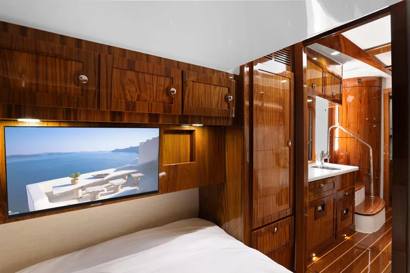 Slide: The Image of Luxurious interior of 2023 HCB 65 Estrella yacht with wood finish and modern amenities. - 49