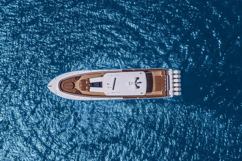 Slide: The Image of Aerial view of HCB 65 Estrella yacht on blue water, 2023 model. - 5