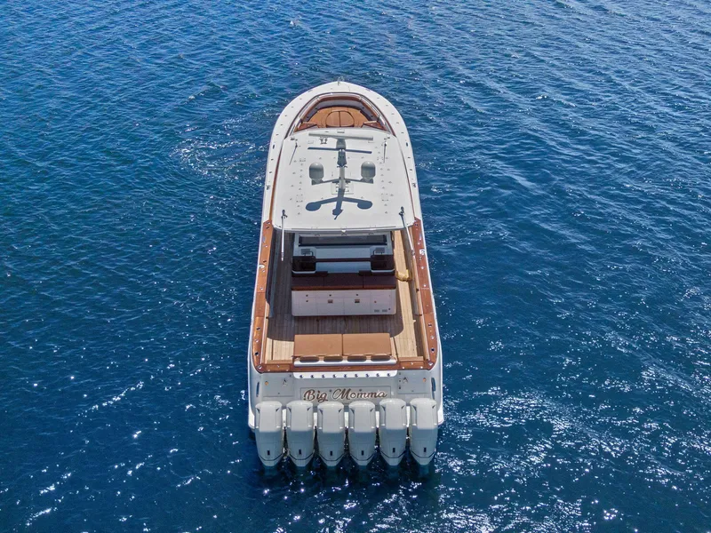 Slide: The Image of 2023 HCB 65 Estrella luxury yacht on open water, aerial view. - 7