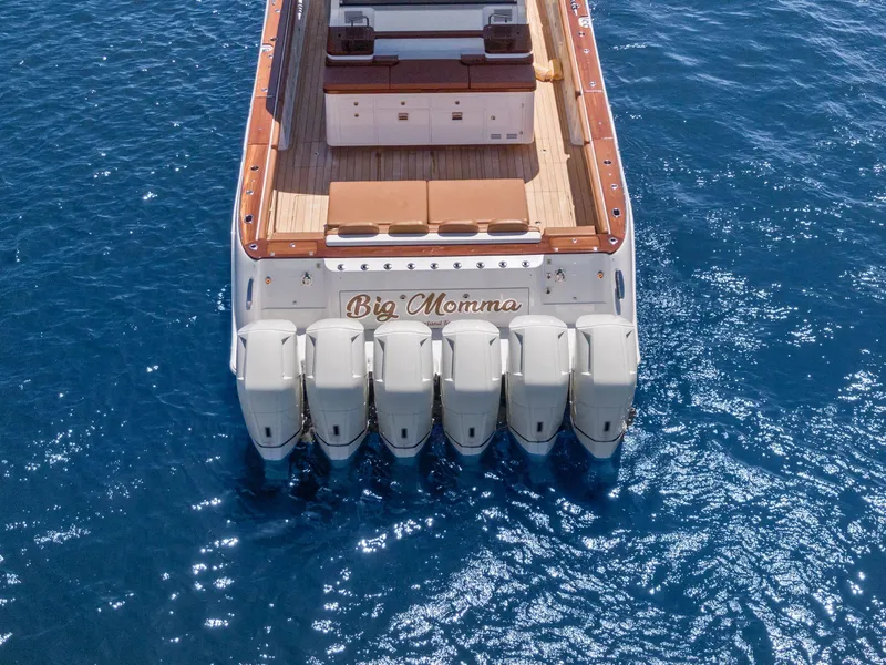 Slide: The Image of HCB 65 Estrella 2023 with six outboard engines on open sea. - 8