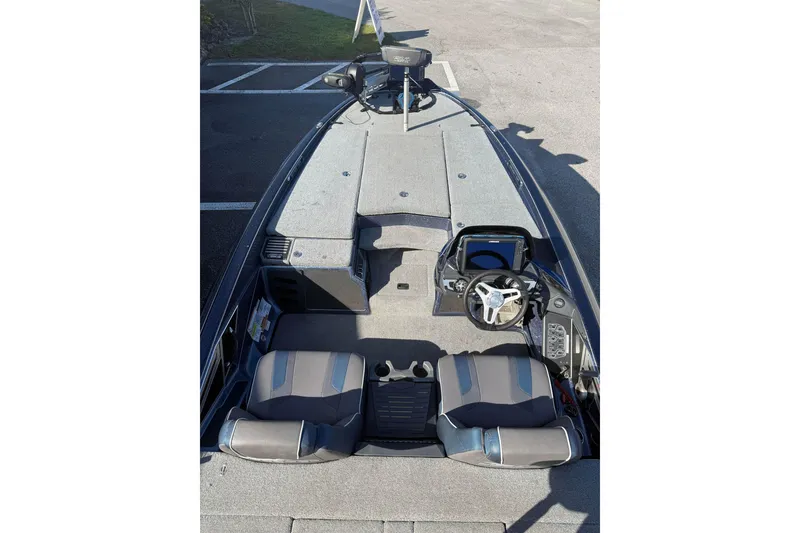 Slide: The Image of 2018 Skeeter FX20 boat interior with dual seats and steering console. - 9