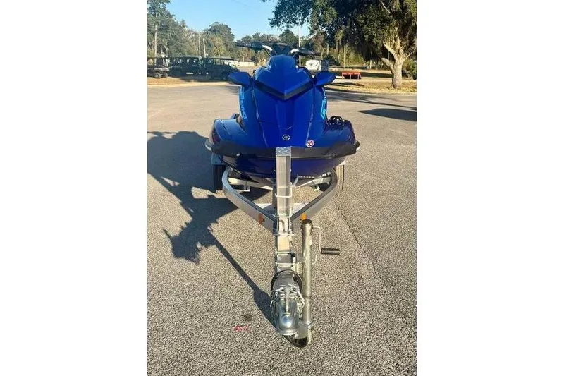 Slide: The Image of 2024 Yamaha WaveRunner GP SVHO on trailer, parked outdoors. - 2